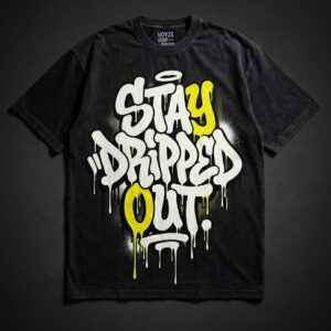 NOYZE DRIP Stay Dripped Out oversized washed black tee with large graffiti throw-up lettering in white and electric yellow reading Stay Dripped Out with drip paint effect and halo detail, Pakistan streetwear